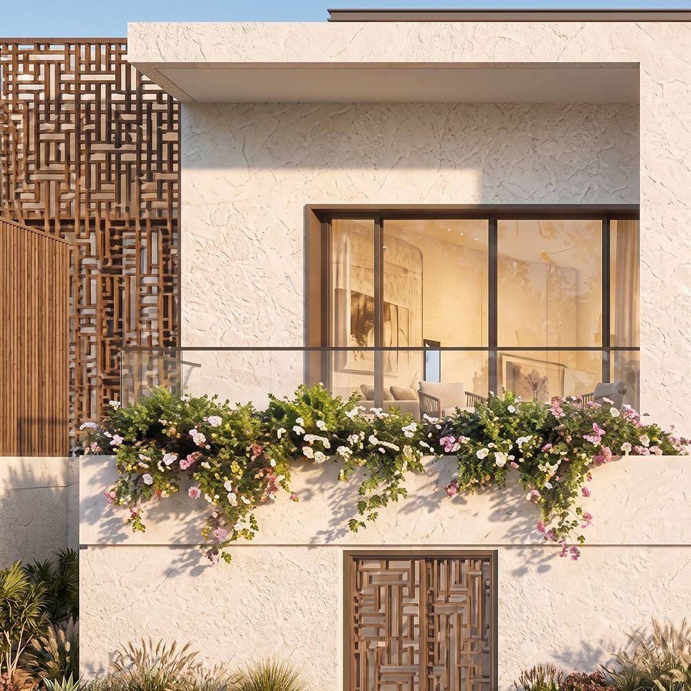 Contemporary Arabic façade detail: a carved mashrabiya screen beside a textured stone wall