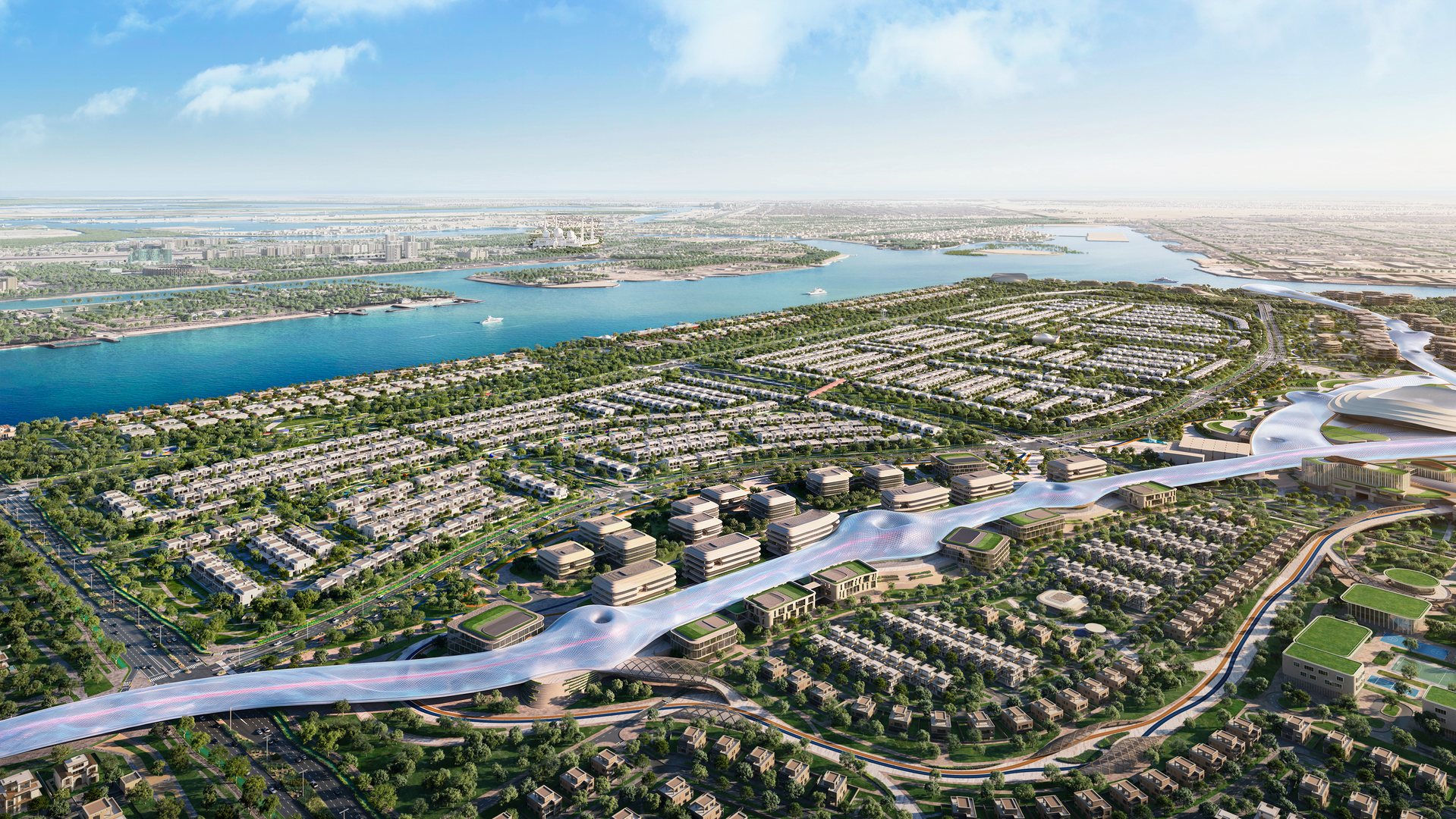 Aerial view of Wadeem Gardens on Hudayriyat Island: villa clusters either side of the climate-controlled spine, with the channel and Sheikh Zayed Grand Mosque beyond