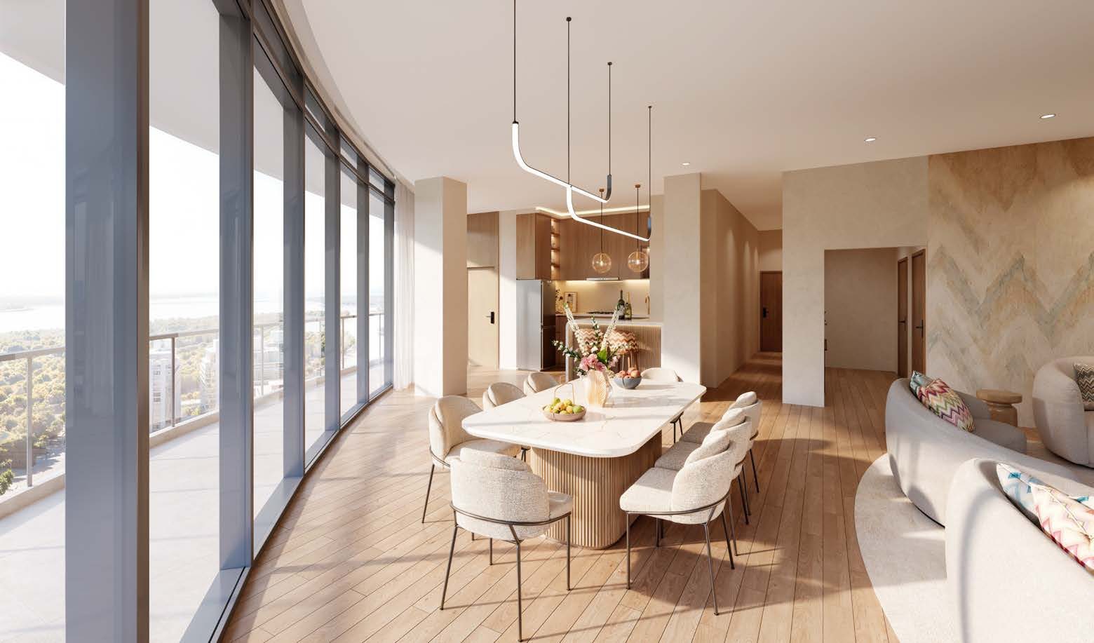 A curved, glazed dining area at Waterfront by Missoni with a marble table and pendant lights